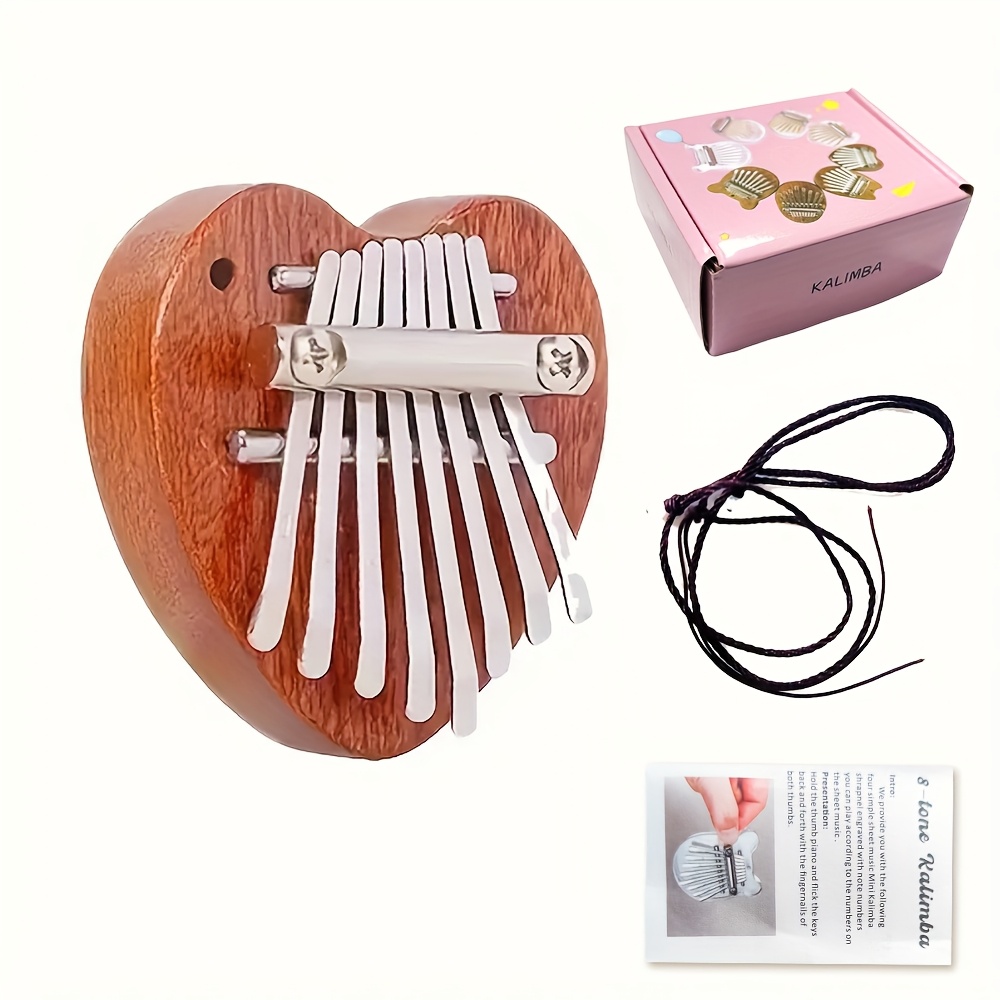 A Musical Instrument With Keys - بيانو كاليمبا خشبي صغير مكون من